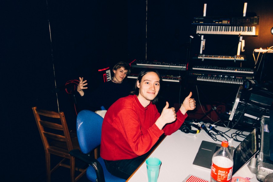 3. Mads and Victor listening to bounces of a hot new demo.
